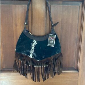 Cowhide purse.  New with tags.  Fringe and back zipped pocket.